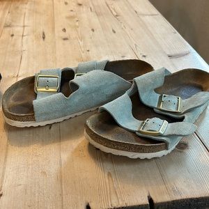 Blue strapped Birkenstocks
